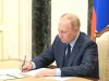 Путин подписал закон о 30-дневном сроке медосмотра для иностранцев